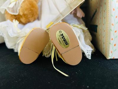 MYD PORCELAIN DOLL W/CERTIFICATE AND SEYMOUR MANN DOLL