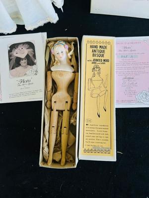 CLASSIC BRIDE OF THE CENTURY, “FLORA” with certificate of authenticity AND REPRODUCTION ANTIQUE HANDMADE WOOD & BISQUE DOLL