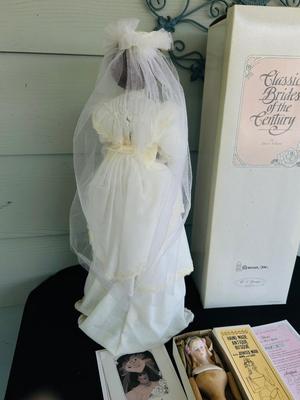 CLASSIC BRIDE OF THE CENTURY, “FLORA” with certificate of authenticity AND REPRODUCTION ANTIQUE HANDMADE WOOD & BISQUE DOLL