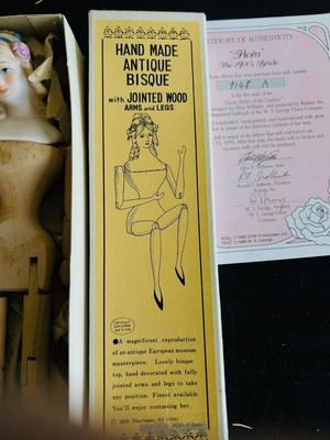CLASSIC BRIDE OF THE CENTURY, “FLORA” with certificate of authenticity AND REPRODUCTION ANTIQUE HANDMADE WOOD & BISQUE DOLL