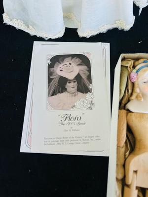 CLASSIC BRIDE OF THE CENTURY, “FLORA” with certificate of authenticity AND REPRODUCTION ANTIQUE HANDMADE WOOD & BISQUE DOLL
