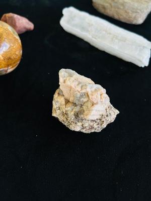 POLISHED EGG SHAPED ROCKS, OTHER STONES, AND MINERALS.
