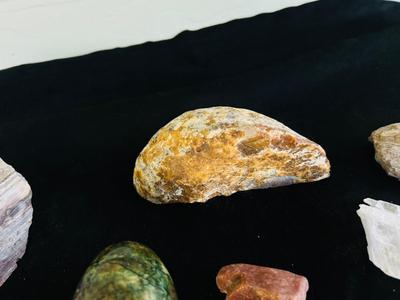 POLISHED EGG SHAPED ROCKS, OTHER STONES, AND MINERALS.