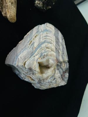 POLISHED EGG SHAPED ROCKS, OTHER STONES, AND MINERALS.