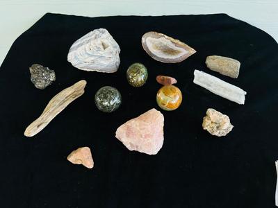 POLISHED EGG SHAPED ROCKS, OTHER STONES, AND MINERALS.