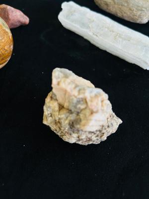 POLISHED EGG SHAPED ROCKS, OTHER STONES, AND MINERALS.