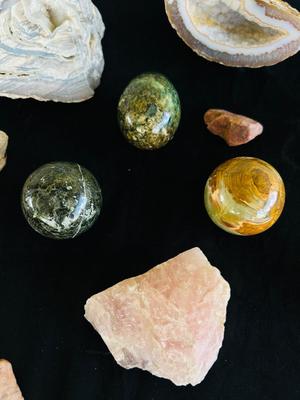 POLISHED EGG SHAPED ROCKS, OTHER STONES, AND MINERALS.