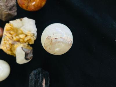 FOOLS GOLD, POLISHED EGGS AND OTHER STONES