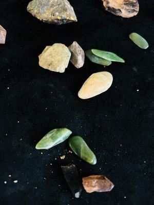 WIND CHIMES, MARBLE EGGS, POLISHED ROCKS AND PATIO WALL ART