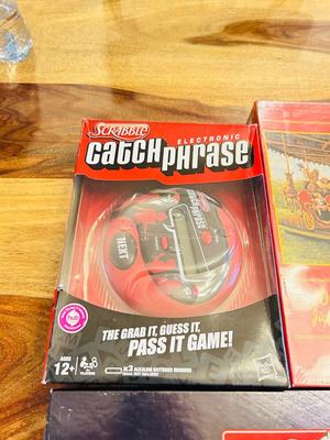SCRABBLE ELECTRONIC CATCHPHRASE, STAR WARS MONOPOLY, AND PUZZLE