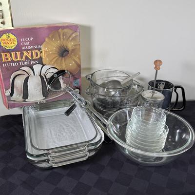 LOT 189K: Baking Collection: Nordic Ware Bundt Pan, Pyrex Dishes, Pampered Chef Measuring Cups & More