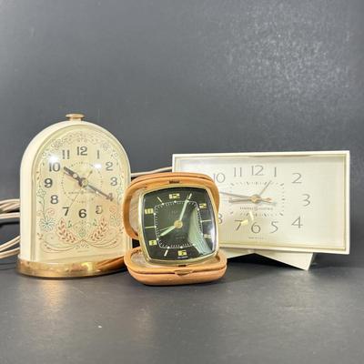 LOT 233D: Vintage Clocks: Elgin Leather Case Pocket Clock made in Western Germany & General Electric Clocks Models 7391-4 & 7309