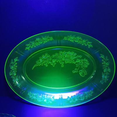 LOT 209: Uranium Glass Serving Platters (2) and Four Plates