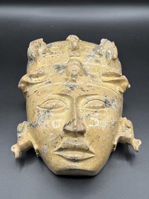 Asian hand-carved stone mask
