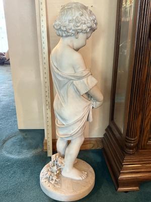 Marble statue-signed by the artist stands 33" tall. 1st floor.