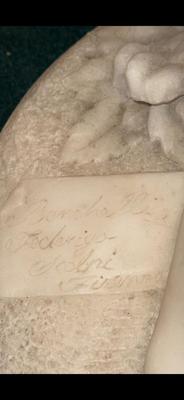 Marble statue-signed by the artist stands 33" tall. 1st floor.