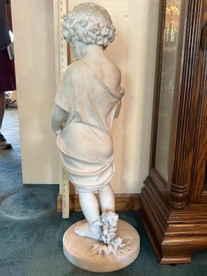 Marble statue-signed by the artist stands 33" tall. 1st floor.