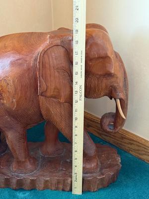 Solid Teak carved elephant stands 19" high