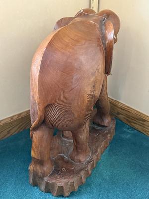 Solid Teak carved elephant stands 19" high