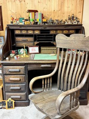 Antique Derby Roll Top Desk in Excellent condition—solid oak--32 1/2 inches deep x 53 1/2 inches wide x 51 inches high at its highest...