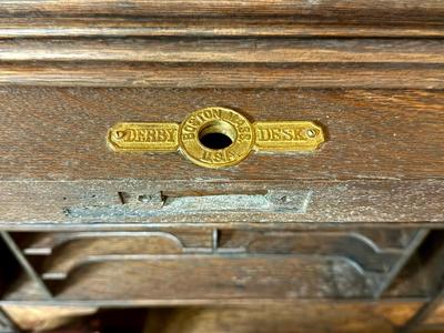 Antique Derby Roll Top Desk in Excellent condition—solid oak--32 1/2 inches deep x 53 1/2 inches wide x 51 inches high at its highest...