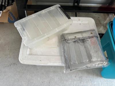 AN ASSORTMENT OF CONTAINERS, HANGERS AND A ROLL OF PLASTIC WRAP