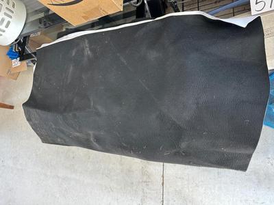 SEVERAL LARGER PIECES OF A FELT LIKE MATERIAL WITH A BACKING