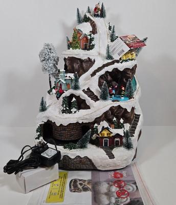 LOT 169X: Alpine Corp. Indoor Animated Winter Wonderland Set with LED lights, Music, Moving Train, and Ice-skaters