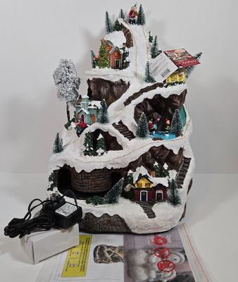 LOT 169X: Alpine Corp. Indoor Animated Winter Wonderland Set with LED lights, Music, Moving Train, and Ice-skaters