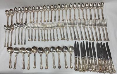 Sale Photo Thumbnail #56: Serving sets for 12,  except missing 1 soup spoon and there are many extra teaspoons and some ice teaspoons.