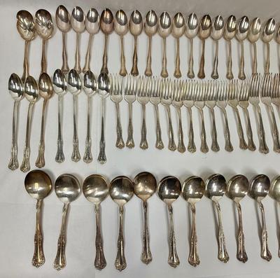 Sale Photo Thumbnail #57: Serving sets for 12,  except missing 1 soup spoon and there are many extra teaspoons and some ice teaspoons.