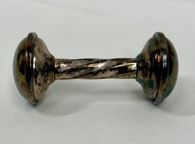 Sale Photo Thumbnail #206: Gotham Electroplate Silver Plate twisted handle baby rattle. Some tarnish from being handled but in very good condition. Approx. 4" long.