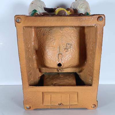 LOT 242: Vintage Piel's Beer Cast Metal Gnome-Themed Bottle Holder
