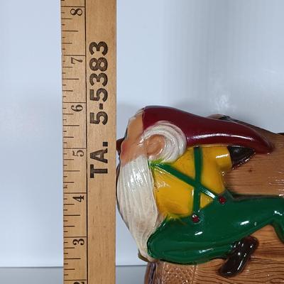LOT 242: Vintage Piel's Beer Cast Metal Gnome-Themed Bottle Holder