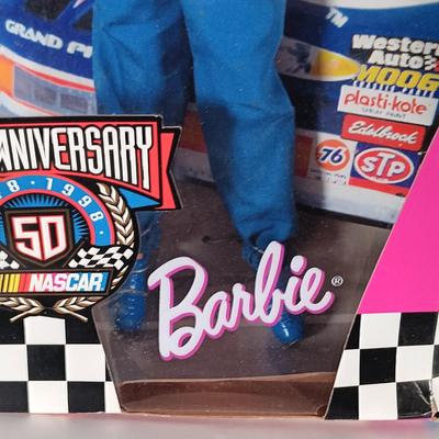 LOT 303: Barbie 1999 Nascar McDonald's Official #94 with (2) 50th Anniversary 1998 Barbies
