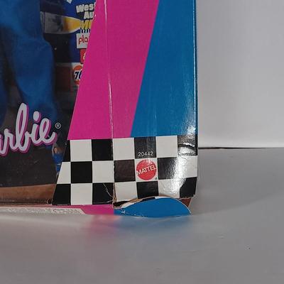 LOT 303: Barbie 1999 Nascar McDonald's Official #94 with (2) 50th Anniversary 1998 Barbies