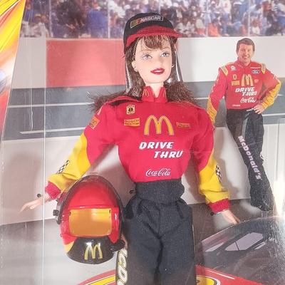 LOT 303: Barbie 1999 Nascar McDonald's Official #94 with (2) 50th Anniversary 1998 Barbies