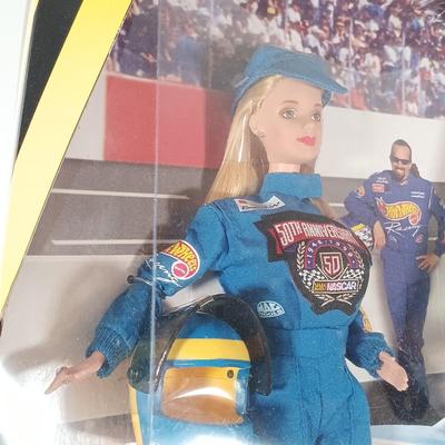 LOT 303: Barbie 1999 Nascar McDonald's Official #94 with (2) 50th Anniversary 1998 Barbies