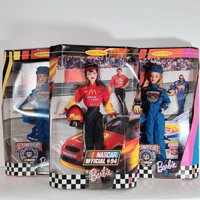 LOT 303: Barbie 1999 Nascar McDonald's Official #94 with (2) 50th Anniversary 1998 Barbies
