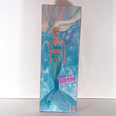 LOT 304: Barbie 1995 Dress Up Game with (2) Silken Flame 1997 Reproduction Barbies & Barbie 1991 Mermaid