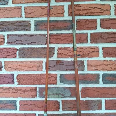 LOT 309: Set of (2) Wooden Fishing Poles with Penn Reels No 35 and No 79 & Wicker Fishing Creel