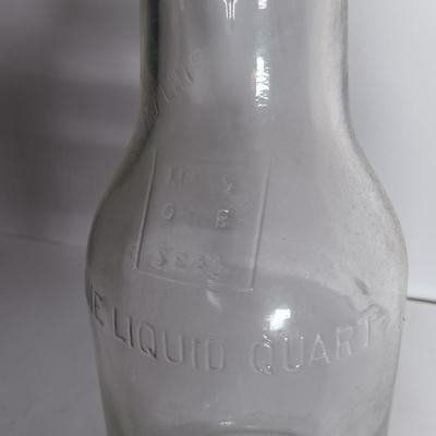 LOT 311: Set of (2) Duraglass Glass Oil Bottles with Moore and Kling Metal Spout & Dover Metal Spout