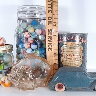 LOT 314: Vintage Marbles, Rubber DeSoto AirFlow Toy Car, Carnival Glass Piggy Bank & Seneca Sauerkraut Coin Bank