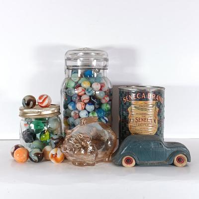 LOT 314: Vintage Marbles, Rubber DeSoto AirFlow Toy Car, Carnival Glass Piggy Bank & Seneca Sauerkraut Coin Bank