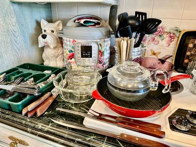 Kitchen Lot 12- Left Side of Stove top display includes Oneida, Knives & InstaPot