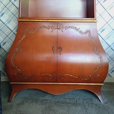 LOT 23L: Vintage Wooden Bookcase with Sliding Door Cabinet and Enameled Design