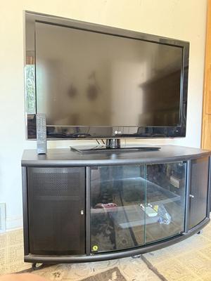 LOT 44F: LG 42" Television Model 42LD220-UA w/ Media Stand