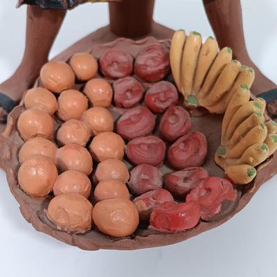 LOT 98L: Vintage Clay Art Woman Selling Fruit, Wood Folk Art Cat, Cantala Fiber Coasters & More