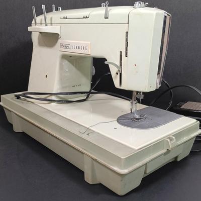 LOT 214L: Sears Kenmore 1701 Zig Zag Sewing Machine with Sewing Notions