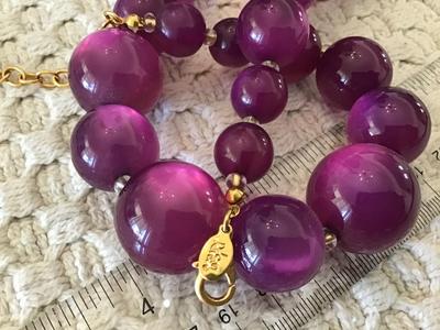 Vintage Joan Rivers moon Glow Purple